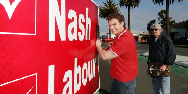 SEEING RED: Napier Labour candidate Stuart Nash took time out from the usual Friday door- knocking to erect election hoardings yesterday.PHOTOS/PAUL TAYLOR HBT142411-02