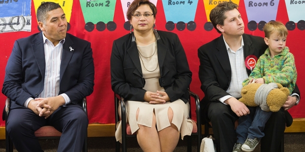Politicians Brendan Horan, Metiria Turei and Michael Wood with his son Daniel, 3, get set for pupils' questions. Photo / Greg Bowker