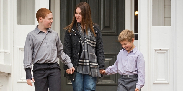 Dianna Perron with her two boys Callum, 10, and 8-year-old Finn Goodson at King's School. Photo / Greg Bowker