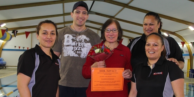 Ngamihi Stephenson (centre) winner of the 100km impact challenge with AMP Wai Splash staff Huia Tracey (left), Phil Hamilin, Luey Pahi and Annette Lilo. Photo/Christine McKay