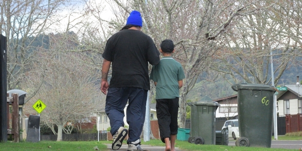 FATHER AND SON: Skip Taitapanui and his son hope to go to a school camp together. PHOTO/KATEE SHANKS 180614SKIP2