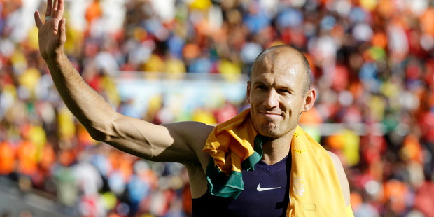 Netherlands' Arjen Robben waves to fans following the team's 3-2 win over Australia. Photo / AP