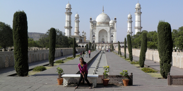 A shy young Indian woman's unscripted family photo. Photo / Graham Reid