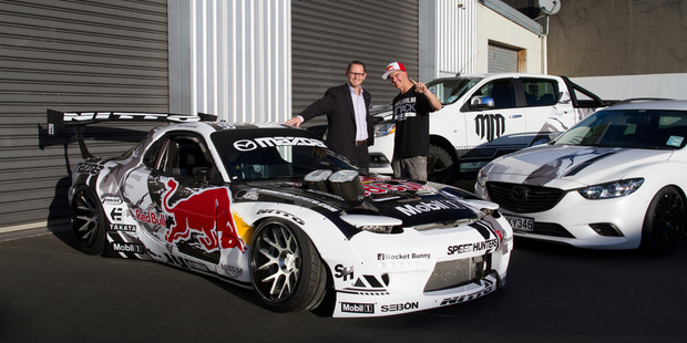 Drifting ace Mike Whiddett, with his RADBUL and Glenn Harris, says securing official backing from Mazda is 'truly mind-blowing'.
Pictures / Brad Lord