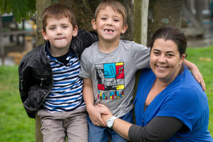 Five-year-old twins Alex (left) and Finn Musty at home in Hamilton with their mother, Katie. Photo / Alan Gibson