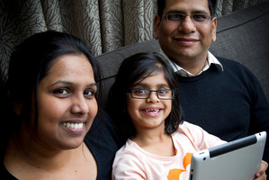 Piya Mohal, pictured with parents Rashmi (left) and Jatender, spends about 90 minutes a day using interactive educational programs. Photo / Sarah Ivey