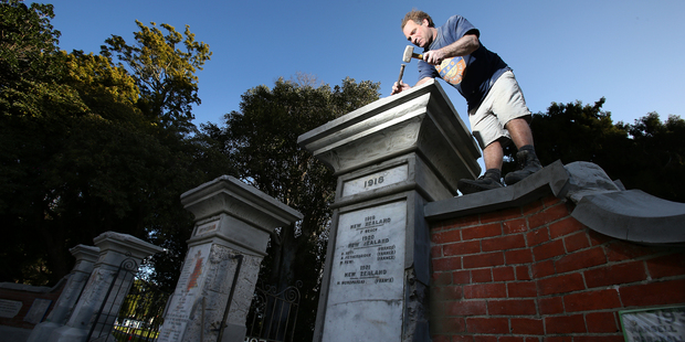 An $80,000 project to restore the historic gates outside the Tauranga Domain began on Monday. Photo / John Borren