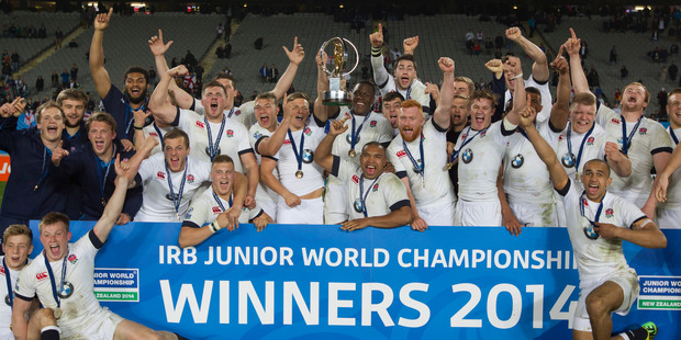 England players celebrate their 21-20 win against South Africa. Photo / Brett Phibbs
