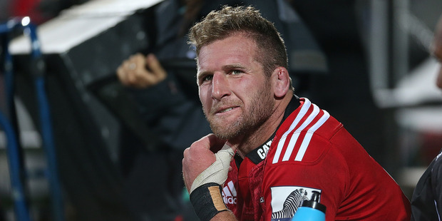 Kieran Read of the Crusaders sits on the sideline after leaving the field during the match between the Crusaders and the Hurricanes for failing a sideline concussion test. Photo / Getty Images