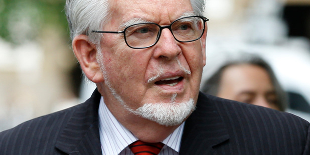 Harris is charged with 12 counts of indecent assault against four girls in the UK between 1968 and 1986. Photo / AP