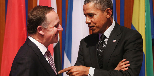 Mr Key says he was nudged up the White House guest list this year by Mr Obama. Photo / AP
