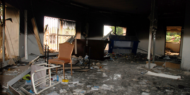 Sept. 12, 2012 file photo shows glass, debris and overturned furniture are strewn inside a room in the gutted U.S. consulate in Benghazi. Photo / AP