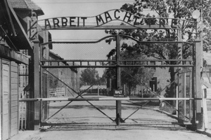 The main gate of the Nazi concentration camp Auschwitz I, Poland. A former guard faces charges over the deaths of 216,000 people there. Photo / AP