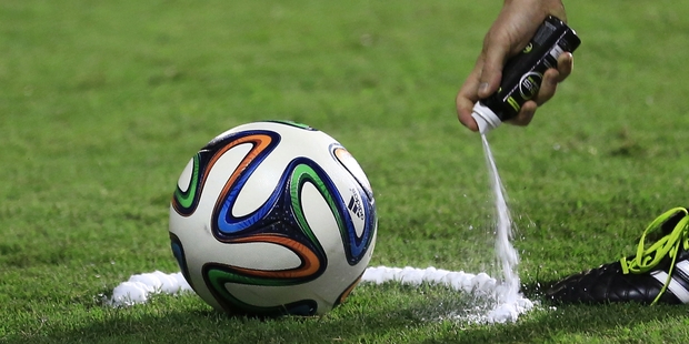 Referees have been using vanishing spray during 2014 World Cup to stop defensive walls creeping forward at free-kicks. Photo / AP
