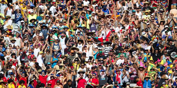 Fans get into the spirit of the NRL Auckland Nines at Eden Park. Photo / Richard Robinson