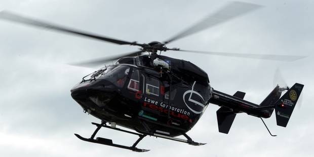 The Lowe Corporation Rescue Helicopter staff put the man to sleep before placing him on a stretcher and winching him into the hovering helicopter. Photo / Paul Taylor