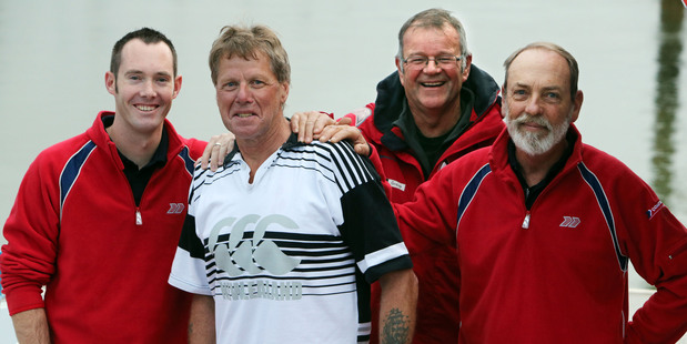 Rescued kayaker Mark Morgan with his Coastguard rescuers - Karl Leathley, skipper John Haselden and David Berg.