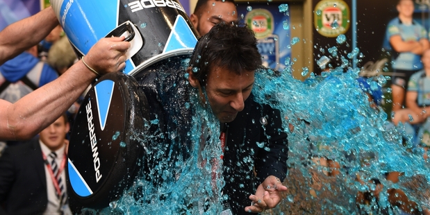 NSW Blues coach Laurie Daley celebrates after his team won the 2014 State of Origin series. Photo / AAP