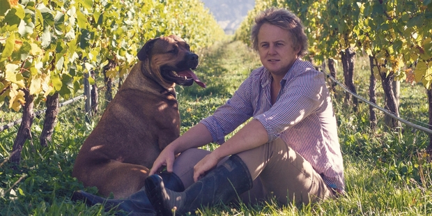 Brad Tiller and his dog, Rhombus.