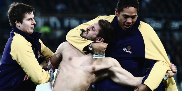 Video of the streaker who was tackled during the test match in Dunedin is a hit on YouTube. Photo / Getty Images