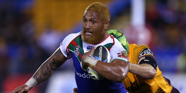 Manu Vatuvei escapes the tackle of the Bronco's Todd Lowrie as the Warriors grind out their win. Photo / Getty Images