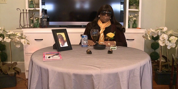 Miriam Burbank attends her own wake.