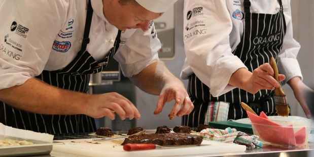 Trainee bakers compete in a Baking Industry Association competition at the Fine Food NZ event in Auckland.