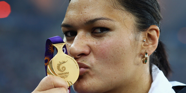 Valerie Adams celebrates with her gold medal at the Delhi 2010 Commonwealth Games. Photo / Getty Images