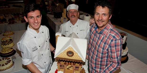 Sam (left), Graham and Jason Heaven, of Heaven's Bakery, show off their gold-medal-winning gingerbread house at the Food Show in Auckland. Photo/Sarah Ivey
