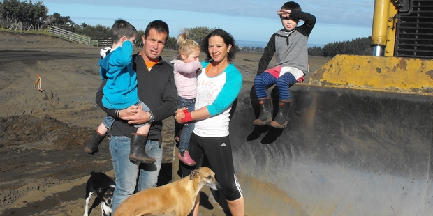 Keryn and Jodie Amon, with their children (from left) Fergus, 3, Lexi, 2, and Archie, 5, on their Tirimoana Place subdivision which is rapidly taking shape. Photo/John Maslin