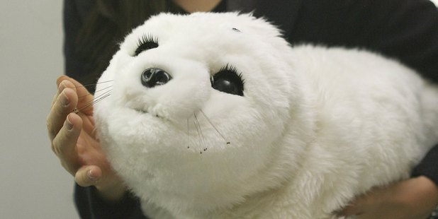 The Paro baby-seal robot has fur, big appealing eyes and can interact with humans. Photo / Getty Images