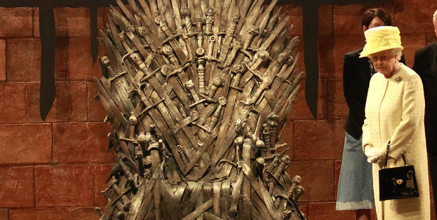 Britain's Queen Elizabeth II visits the throne room at the set of the Game of Thrones TV series in Belfast's Titanic Quarter in Northern Ireland.