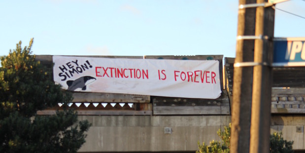 An Oil Free Wellington banner on the City to Sea bridge. Photo / supplied