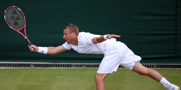 Australia's Lleyton Hewitt in action during his second round loss to Jerzy Janowicz of Poland on day five of Wimbledon. Photo / Getty Images