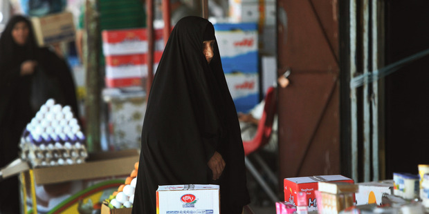 Isis militants have been going door to door asking about the numbers of married and unmarried women. Photo / AP