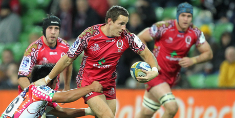 Mike Harris of the Reds is tackled during the round 17 Super Rugby match between the Rebels and the Reds at AAMI Park in Melbourne. Photo / Getty Images