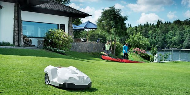 This Automower has its own elaborate house.