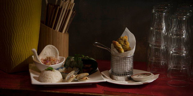 Cafe Viet's Grilled fish in banana leaf and Bang Bang Prawns. Photo / Chris Loufte