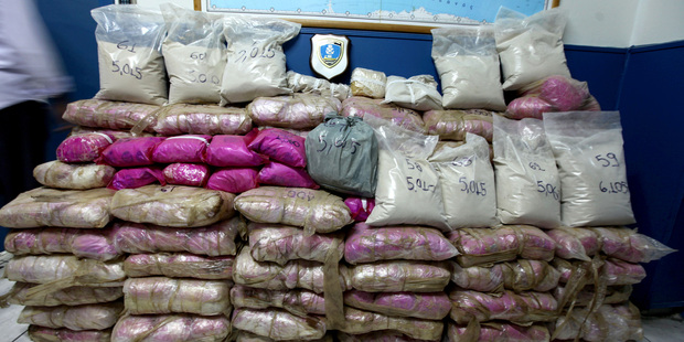 This photo released by the Greek Coast Guard shows stacked heroin packages seized in an operation near Athens. Photo / via AP