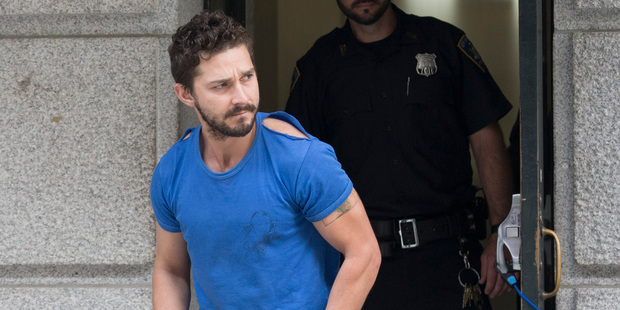 Actor Shia LaBeouf leaves Midtown Community Court after being arrested the previous day for yelling obscenities at the Broadway show "Cabaret,". Photo / AP