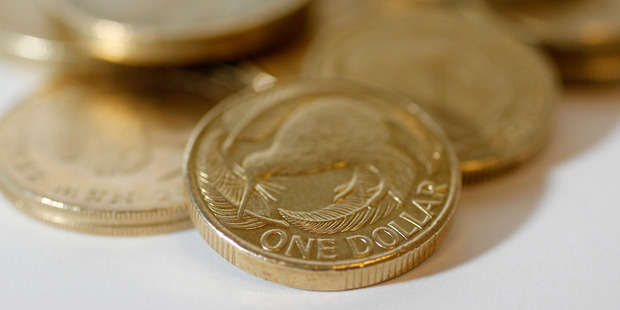 NZ dollar drops to three-year low