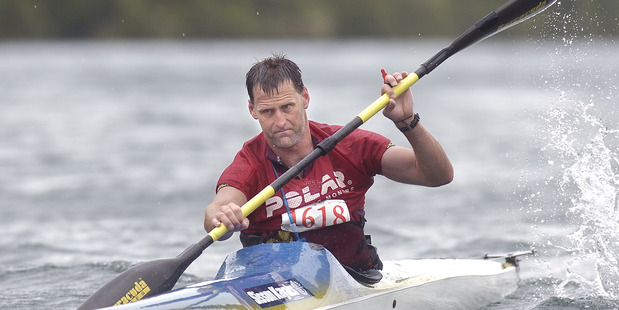 130107bf2 Individual entry Scott Donaldson from Rotorua comes from the kayak leg of the Wild Moa on Lake Tarawera on Saturday 13 January 2007 Daily Post Photograph by Ben Fraser DPM 25Apr14