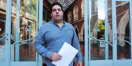 Blogger Cameron Slater leaves Auckland High Court after appearing in a defamation case brought by Matt Blomfield. Photo / Doug Sherring