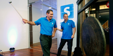 Serko co-founders Bob Shaw (left) and Darrin Grafton mark the company's listing on the NZX. Photo / Chris Gorman
