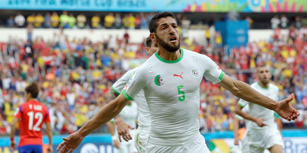 Algeria's Rafik Halliche celebrates after scoring his side's second goal. Photo / AP