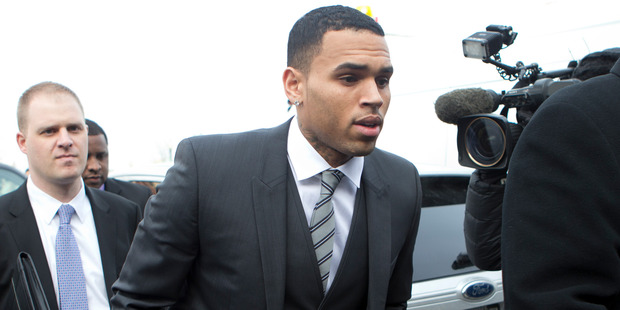Chris Brown arrives at court in Washington. Photo / AP
