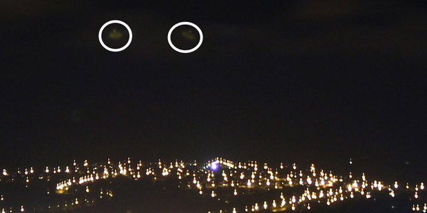 Terence Huang says he took this picture on Monday night - but didn't notice the two circled objects in the sky until yesterday when he uploaded the photo. Photo / supplied to ODT