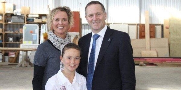 The photo in question, showing Anna Lorck and her daughter Augusta with Prime Minister John Key.Photo/Supplied
