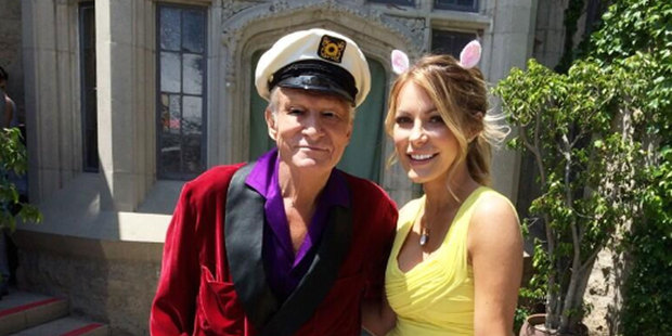 Playboy founder Hugh Hefner and his wife Crystal in front of the Playboy Mansion. Photo / Twitter @hughhefner