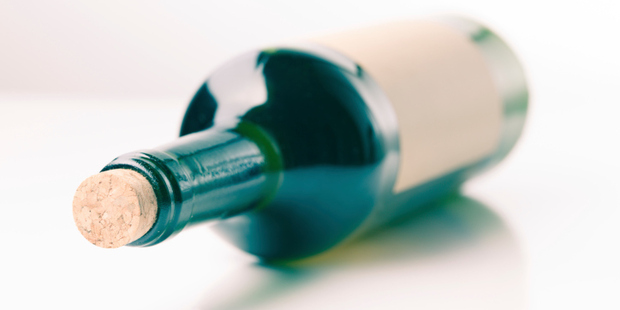 Some wine forgers print their own labels to alter cheap bottles; others buy empties of the best years and makes, then refill them with other wines. Photo / Thinkstock